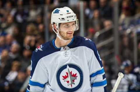 TORONTO, ON – OCTOBER 27: Jacob Trouba #8 of the Winnipeg Jets looks on against the Toronto Maple Leafs during the first period at the Scotiabank Arena on October 27, 2018 in Toronto, Ontario, Canada. (Photo by Kevin Sousa/NHLI via Getty Images)