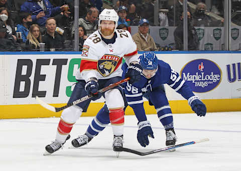 Claude Giroux #28 of the Florida Panthers skates against Michael Bunting #58 of the Toronto Maple Leafs (Photo by Claus Andersen/Getty Images)