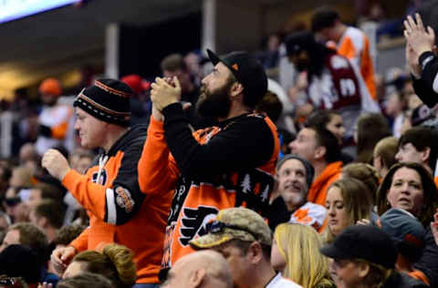 Mar 24, 2016; Denver, CO, USA; Philadelphia Flyers fans cheer a goal by right wing Pierre-Edouard Bellemare (not pictured) in the second period against the Colorado Avalanche at the Pepsi Center. Mandatory Credit: Ron Chenoy-USA TODAY Sports