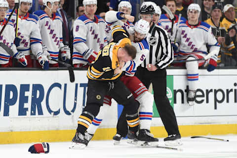 BOSTON, MA – JANUARY 19: Adam McQuaid #54 of the New York Rangers fights against Chris Wagner #14 of the Boston Bruins at the TD Garden on January 19, 2019 in Boston, Massachusetts. (Photo by Steve Babineau/NHLI via Getty Images)