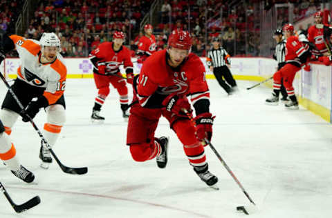 RALEIGH, NC – NOVEMBER 21: Jordan Staal #11 of the Carolina Hurricanes skates with the puck during an NHL game against the Philadelphia Flyers on November 21, 2019 at PNC Arena in Raleigh, North Carolina. (Photo by Gregg Forwerck/NHLI via Getty Images)