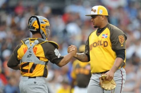 Jul 10, 2016; San Diego, CA, USA; World pitcher Adalberto Mejia (right) celebrates with catcher Francisco Mejia (left) after defeating USA during the All Star Game futures baseball game at PetCo Park. Mandatory Credit: Gary A. Vasquez-USA TODAY Sports