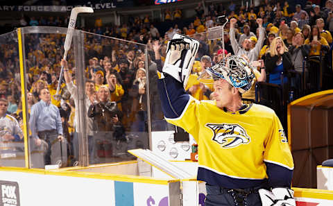 NASHVILLE, TN – FEBRUARY 22: Pekka Rinne #35 of the Nashville Predators acknowledges the fans applause on his 300th career win after a 7-1 victory against the San Jose Sharks during an NHL game at Bridgestone Arena on February 22, 2018 in Nashville, Tennessee. (Photo by John Russell/NHLI via Getty Images)