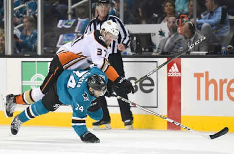 SAN JOSE, CA: Dylan DeMelo #74 of the San Jose Sharks and Nick Ritchie #37 of the Anaheim Ducks collide during the first period in Game Four of the Western Conference First Round on April 18, 2018. (Photo by Thearon W. Henderson/Getty Images)