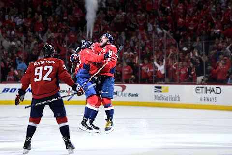 WASHINGTON, DC – MAY 05: Jakub Vrana #13 of the Washington Capitals celebrates with Alex Ovechkin #8 after scoring a third period goal against the Pittsburgh Penguins in Game Five of the Eastern Conference Second Round during the 2018 NHL Stanley Cup Playoffs at Capital One Arena on May 5, 2018 in Washington, DC. (Photo by Patrick McDermott/NHLI via Getty Images)