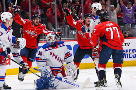 WASHINGTON, DC – OCTOBER 18: Washington Capitals right wing T.J. Oshie (77) celebrates after scoring in the first period against New York Rangers goaltender Henrik Lundqvist (30) on October 18, 2019, at the Capital One Arena in Washington, D.C. (Photo by Mark Goldman/Icon Sportswire via Getty Images)