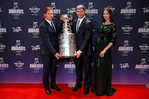 LAS VEGAS, NV – JUNE 20: Nicklas Backstrom of the Washington Capitals and teammate Alex Ovechkin with his wife, Anastasia Shubskaya, pose with the Stanley Cup on the red carpet during the 2018 NHL Awards presented by Hulu at The Joint, Hard Rock Hotel & Casino on June 20, 2018 in Las Vegas, Nevada. (Photo by Jeff Speer/Icon Sportswire via Getty Images)