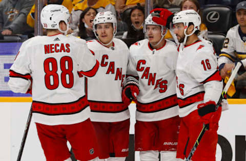 NASHVILLE, TENNESSEE – MAY 27: Martin Necas #88 and Vincent Trocheck #16 of the Carolina Hurricanes celebrate with teammates after a goal against the Nashville Predators during the second period in Game Six of the First Round of the 2021 Stanley Cup Playoffs at Bridgestone Arena on May 27, 2021, in Nashville, Tennessee. (Photo by Frederick Breedon/Getty Images)