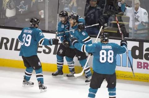 May 7, 2016; San Jose, CA, USA; San Jose Sharks center Joe Pavelski (8) is congratulated for scoring a goal against the Nashville Predators during the second period in game five of the second round of the 2016 Stanley Cup Playoffs at SAP Center at San Jose. Mandatory Credit: Kyle Terada-USA TODAY Sports