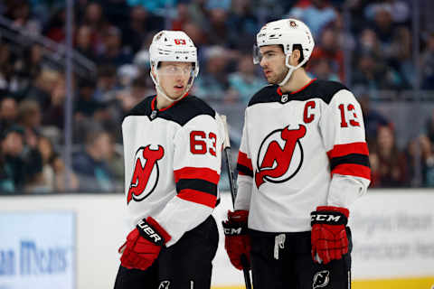 Jesper Bratt #63 and Nico Hischier #13 of the New Jersey Devils. (Photo by Steph Chambers/Getty Images )