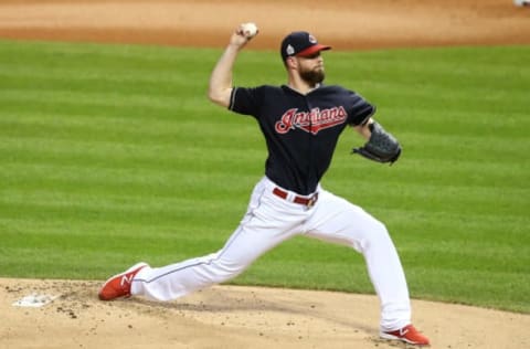 Nov 2, 2016; Cleveland, OH, USA; Cleveland Indians starting pitcher Corey Kluber throws a pitch against the Chicago Cubs in the first inning in game seven of the 2016 World Series at Progressive Field. Mandatory Credit: Charles LeClaire-USA TODAY Sports