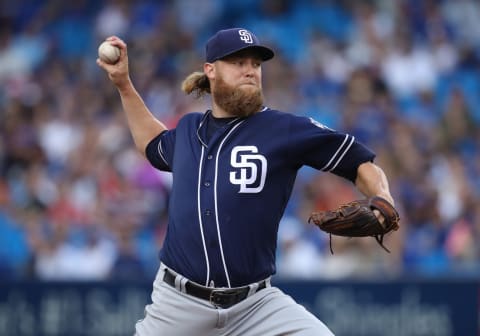 TORONTO, CANADA – JULY 26: Andrew Cashner #34 of the San Diego Padres delivers a pitch in the first inning during MLB game action against the Toronto Blue Jays on July 26, 2016 at Rogers Centre in Toronto, Ontario, Canada. (Photo by Tom Szczerbowski/Getty Images)