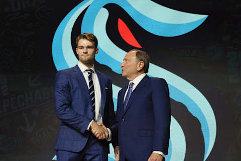 MONTREAL, QUEBEC – JULY 07: Shane Wright is selected number four overall by the Seattle Kraken and shakes hands with NHL commissioner Gary Bettman attends the 2022 NHL Draft at the Bell Centre on July 07, 2022, in Montreal, Quebec, Canada. (Photo by Bruce Bennett/Getty Images)