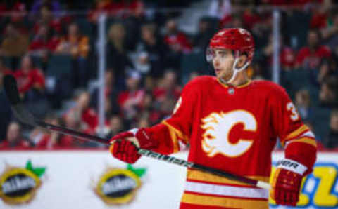 Apr 12, 2023; Calgary, Alberta, CAN; Calgary Flames right wing Matt Coronato (39) against the San Jose Sharks during the third period at Scotiabank Saddledome. Mandatory Credit: Sergei Belski-USA TODAY Sports