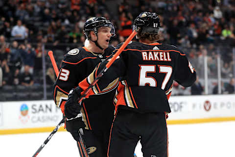 Rickard Rakell #67 congratulates Jakob Silfverberg #33 of the Anaheim Ducks (Photo by Sean M. Haffey/Getty Images)