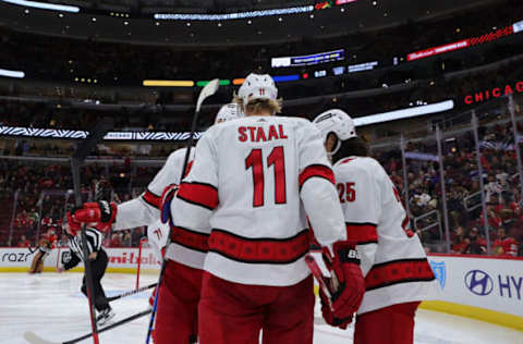 CHICAGO, ILLINOIS – NOVEMBER 03: Members of the Carolina Hurricanes celebrate a goal against the Chicago Blackhawks during the third period at United Center on November 03, 2021, in Chicago, Illinois. (Photo by Stacy Revere/Getty Images)