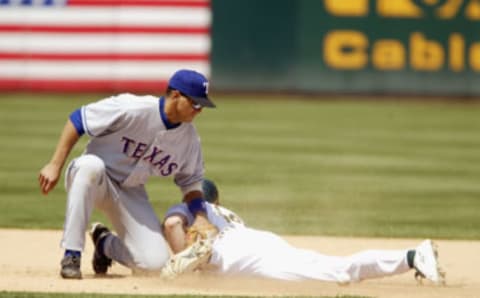 Alex Rodriguez at shortstop for the Texas Rangers. (Photo by Jed Jacobsohn/Getty Images)