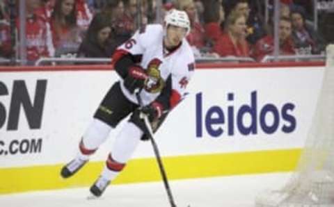 Jan 10, 2016; Washington, DC, USA; Ottawa Senators defenseman Patrick Wiercioch (46) controls the puck against the Washington Capitals during the first period at Verizon Center. Mandatory Credit: Rafael Suanes-USA TODAY Sports