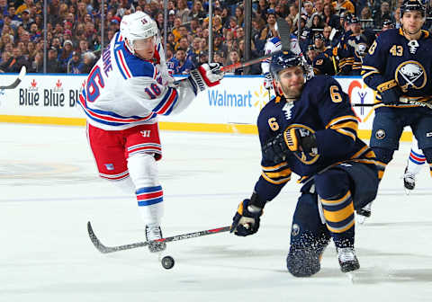 BUFFALO, NY – FEBRUARY 15: Marco Scandella #6 of the Buffalo Sabres attempts to block a shot by Ryan Strome #16 of the New York Rangers during an NHL game on February 15, 2019 at KeyBank Center in Buffalo, New York. (Photo by Sara Schmidle/NHLI via Getty Images)