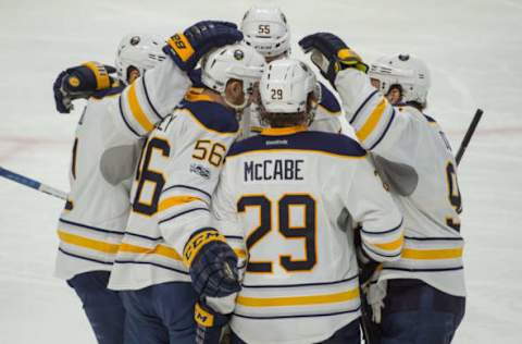 NHL Power Rankings: The Buffalo Sabres celebrate a goal scored by right wing Justin Bailey (56) in the third period against the Ottawa Senators at the Canadian Tire Centre. The Sabres defeated the Senators 3-2. Mandatory Credit: Marc DesRosiers-USA TODAY Sports