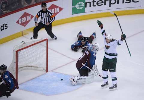 DENVER, CO – APRIL 30: Nino Niederreiter (22) of the Minnesota Wild reacts after he scored the game-winning goal in overtime past Semyon Varlamov (1) of the Colorado Avalanche. The Colorado Avalanche fell 5-4 to the Minnesota Wild in game 7 of their Stanley Cup Playoff series at the Pepsi Center in Denver, Colorado on Wednesday, April 30, 2014. (Photo by Karl Gehring/The Denver Post via Getty Images)