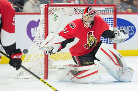 Jan 26, 2016; Ottawa, Ontario, CAN; Ottawa Senators goalie Craig Anderson (41) makes a save in the first period against the Buffalo Sabres at the Canadian Tire Centre. Mandatory Credit: Marc DesRosiers-USA TODAY Sports