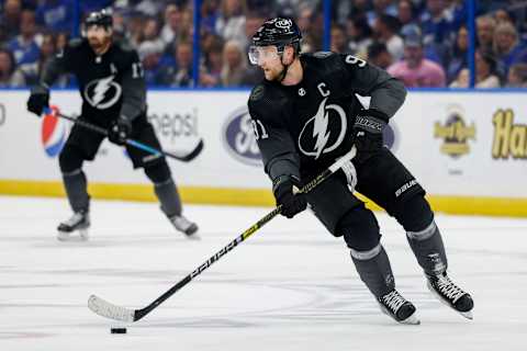 Nov 13, 2021; Tampa, Florida, USA; Tampa Bay Lightning center Steven Stamkos (91) looks to pass the puck in the third period against the Florida Panthers at Amalie Arena. Mandatory Credit: Nathan Ray Seebeck-USA TODAY Sports