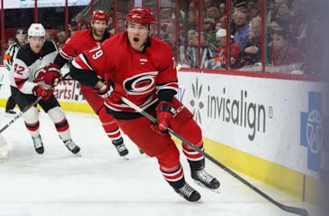 RALEIGH, NC – APRIL 04: Carolina Hurricanes Left Wing Micheal Ferland (79) skates the puck around the back of the net during a game between the New Jersey Devils and the Carolina Hurricanes at the PNC Arena in Raleigh, NC on April 4, 2019. (Photo by Greg Thompson/Icon Sportswire via Getty Images)