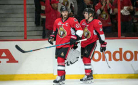 Ottawa Senators defenseman Erik Karlsson (65) and center Jean-Gabriel Pageau (44) celebrate the Ottawa home jersey (Marc DesRosiers-USA TODAY Sports)