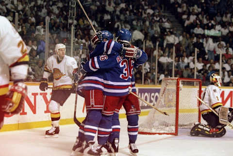 Jun 1994: The New York Rangers celebrate after they score against the Vancover Canucks during the Stanley Cup Finals at the Pacific Coliseum in Vancover, Canada. Mandatory Credit: Mike Powell /Allsport