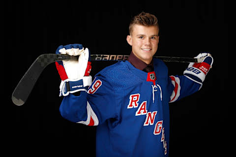 Hunter Skinner poses after being selected 112nd overall by the New York Rangers (Photo by Kevin Light/Getty Images)