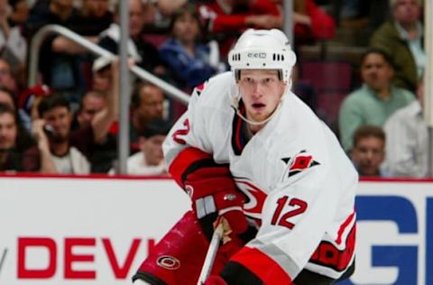 EAST RUTHERFORD, NJ – MAY 13: Eric Staal #12 of the Carolina Hurricanes skates with the puck against the New Jersey Devils in game four of the Eastern Conference Semifinals during the 2006 NHL Playoffs on May 13, 2006 at the Continental Airlines Arena in East Rutherford, New Jersey. The Devils defeated Hurricanes 5-1. The Hurricanes lead the series 3-1. (Photo by Jim McIsaac/Getty Images)