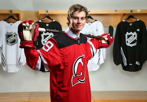 VANCOUVER, BRITISH COLUMBIA – JUNE 21: Jack Hughes, first overall pick by the New Jersey Devils, poses for a portrait during the first round of the 2019 NHL Draft at Rogers Arena on June 21, 2019 in Vancouver, Canada. (Photo by Andre Ringuette/NHLI via Getty Images)