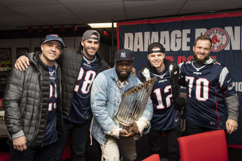 FOXBOROUGH, MA – NOVEMBER 4: Steve Pearce #25, J.D. Martinez #28, Brock Holt #12, and Ryan Brasier #70 of the Boston Red Sox pose for a photograph with rapper 50 Cent before a game against the Green Bay Packers on November 4, 2018 at Gillette Stadium in Foxborough, Massachusetts. (Photo by Billie Weiss/Boston Red Sox/Getty Images)