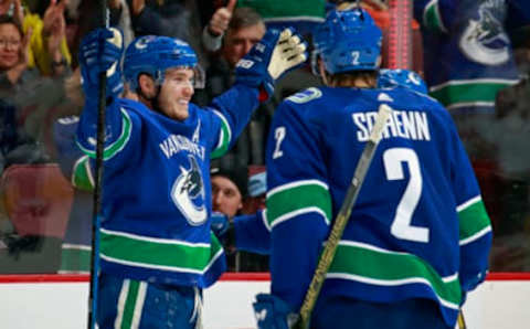 VANCOUVER, BC – FEBRUARY 25: Bo Horvat #53 of the Vancouver Canucks is congratulated by teammate Luke Schenn #2 after scoring during their NHL game against the Anaheim Ducks at Rogers Arena February 25, 2019 in Vancouver, British Columbia, Canada. (Photo by Jeff Vinnick/NHLI via Getty Images)