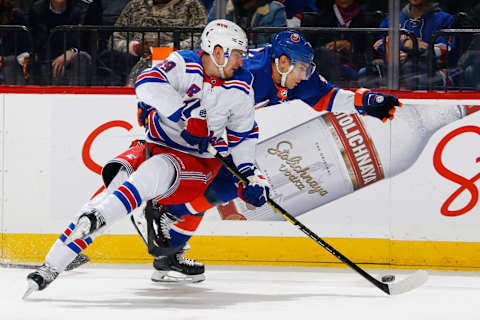 NEW YORK, NY – JANUARY 12: Pavel Buchnevich #89 of the New York Rangers plays the puck against Valtteri Filppula #51 of the New York Islanders at Barclays Center on January 12, 2019 the Brooklyn borough of New York City. (Photo by Mike Stobe/NHLI via Getty Images)