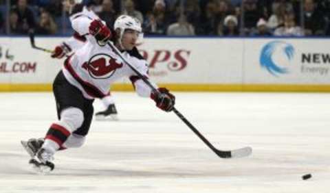 Dec 15, 2015; Buffalo, NY, USA; New Jersey Devils left wing Mike Cammalleri (13) makes a pass during the first period against the Buffalo Sabres at First Niagara Center. Mandatory Credit: Timothy T. Ludwig-USA TODAY Sports