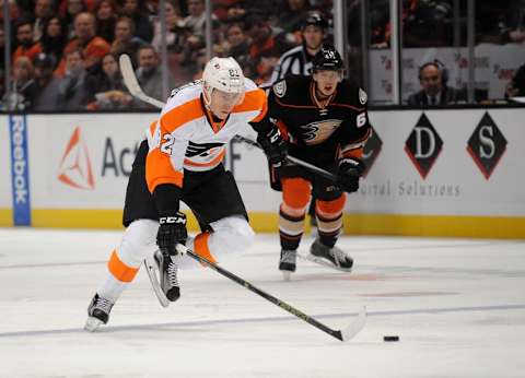 December 27, 2015; Anaheim, CA, USA; Philadelphia Flyers defenseman Evgeny Medvedev (82) moves the puck against Anaheim Ducks during the third period at Honda Center. Mandatory Credit: Gary A. Vasquez-USA TODAY Sports