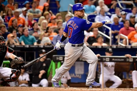 Jun 24, 2016; Miami, FL, USA; Chicago Cubs catcher Willson Contreras (40) connects for an RBI single during the seventh inning against the Miami Marlins at Marlins Park. Mandatory Credit: Steve Mitchell-USA TODAY Sports