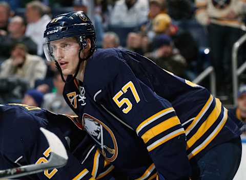 BUFFALO, NY – DECEMBER 10: Tyler Myers #57 of the Buffalo Sabres prepares for a face-off against the Ottawa Senators at First Niagara Center on December 10, 2013 in Buffalo, New York. (Photo by Jen Fuller/Getty Images)