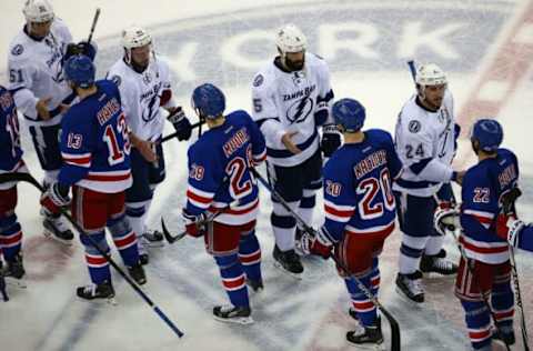 NEW YORK, NY – MAY 29: The New York Rangers shake hands with the Tampa Bay Lightning after the Lighting defeated the Ranges by a score of 2-0 in Game Seven of the Eastern Conference Finals during the 2015 NHL Stanley Cup Playoffs at Madison Square Garden on May 29, 2015 in New York City. (Photo by Elsa/Getty Images)