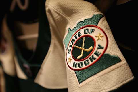 MINNEAPOLIS, MN – FEBRUARY 21: A detailed view of the jersey of Zach Parise #11 of the Minnesota Wild is seen in the locker room prior to the 2016 Coors Light Stadium Series game between the Chicago Blackhawks and the Minnesota Wild at TCF Bank Stadium on February 21, 2016 in Minneapolis, Minnesota. (Photo by Dave Sandford/NHLI via Getty Images)