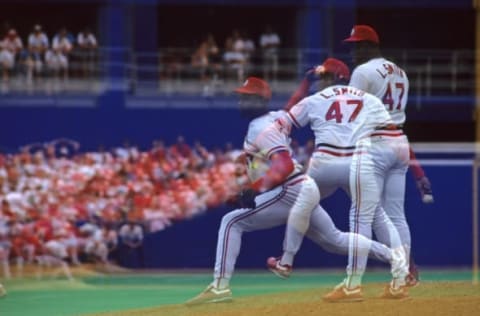 ST. LOUIS, MO – CIRCA 1991: (EDITORS NOTE: Multiple Exposure Image.) St. Louis Cardinals relief pitcher Lee Smith delivers a pitch during a game circa 1991 at Busch Stadium in St. Louis, Missouri. (Photo by St. Louis Cardinals, LLC/Getty Images)