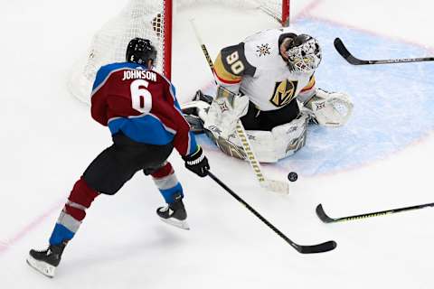 Erik Johnson #6 of the Colorado Avalanche attempts a shot on Robin Lehner #90 of the Vegas Golden Knights during the third period in a Western Conference Round Robin game during the 2020 NHL Stanley Cup Playoff. (Photo by Jeff Vinnick/Getty Images)