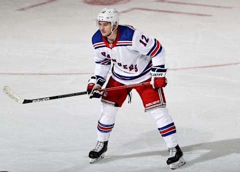 NEWARK, NEW JERSEY – MARCH 06: Julien Gauthier #12 of the New York Rangers skates against the New Jersey Devils at Prudential Center on March 06, 2021 in Newark, New Jersey.A limited number of fans are in attendance due to COVID-19 restrictions.The New York Rangers defeated the New Jersey Devils 6-3. (Photo by Elsa/Getty Images)