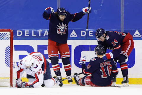 New York Rangers left wing Artemi Panarin (10) and center Ryan Strome (16) and right wing Kaapo Kakko (24) celebrate after a goal Mandatory Credit: Bruce Bennett/Pool Photo-USA TODAY Sports