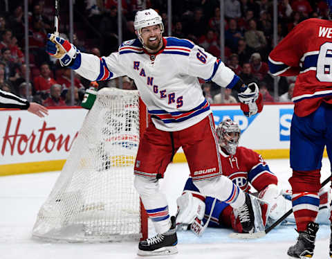 Apr 20, 2017; Montreal, Quebec, CAN; New York Rangers forward Rick Nash (61) reacts after teammate Brady Skjei (not pictured) scores a goal against Montreal Canadiens goalie Carey Price (31) during the second period in game five of the first round of the 2017 Stanley Cup Playoffs at the Bell Centre. Mandatory Credit: Eric Bolte-USA TODAY Sports