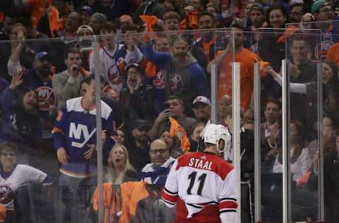 NEW YORK, NEW YORK – APRIL 26: Jordan Staal #11 of the Carolina Hurricanes goes to the penalty box for a second period faceoff violation against the New York Islanders in Game One of the Eastern Conference Second Round during the 2019 NHL Stanley Cup Playoffs at the Barclays Center on April 26, 2019 in the Brooklyn borough of New York City. (Photo by Bruce Bennett/Getty Images)