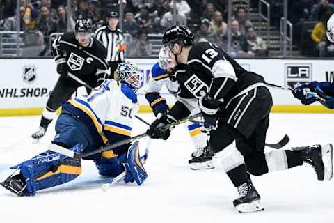 Mar 4, 2023; Los Angeles, California, USA; St. Louis Blues goalie Jordan Binnington (50) blocks the puck in front of Los Angeles Kings center Gabriel Vilardi (13) during the second period at Crypto.com Arena. Mandatory Credit: Kelvin Kuo-USA TODAY Sports