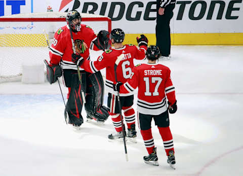 The Chicago Blackhawks celebrate a 3-1 victory over the Vegas Golden Knights in Game Four of the Western Conference First Round during the 2020 NHL Stanley Cup Playoffs. (Photo by Jeff Vinnick/Getty Images)